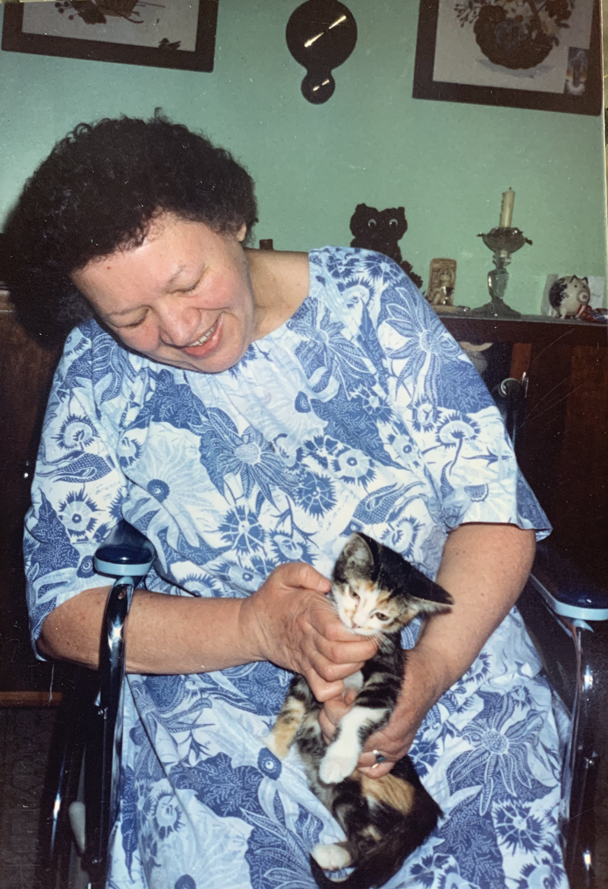 Mom holding Tiger as a kitten